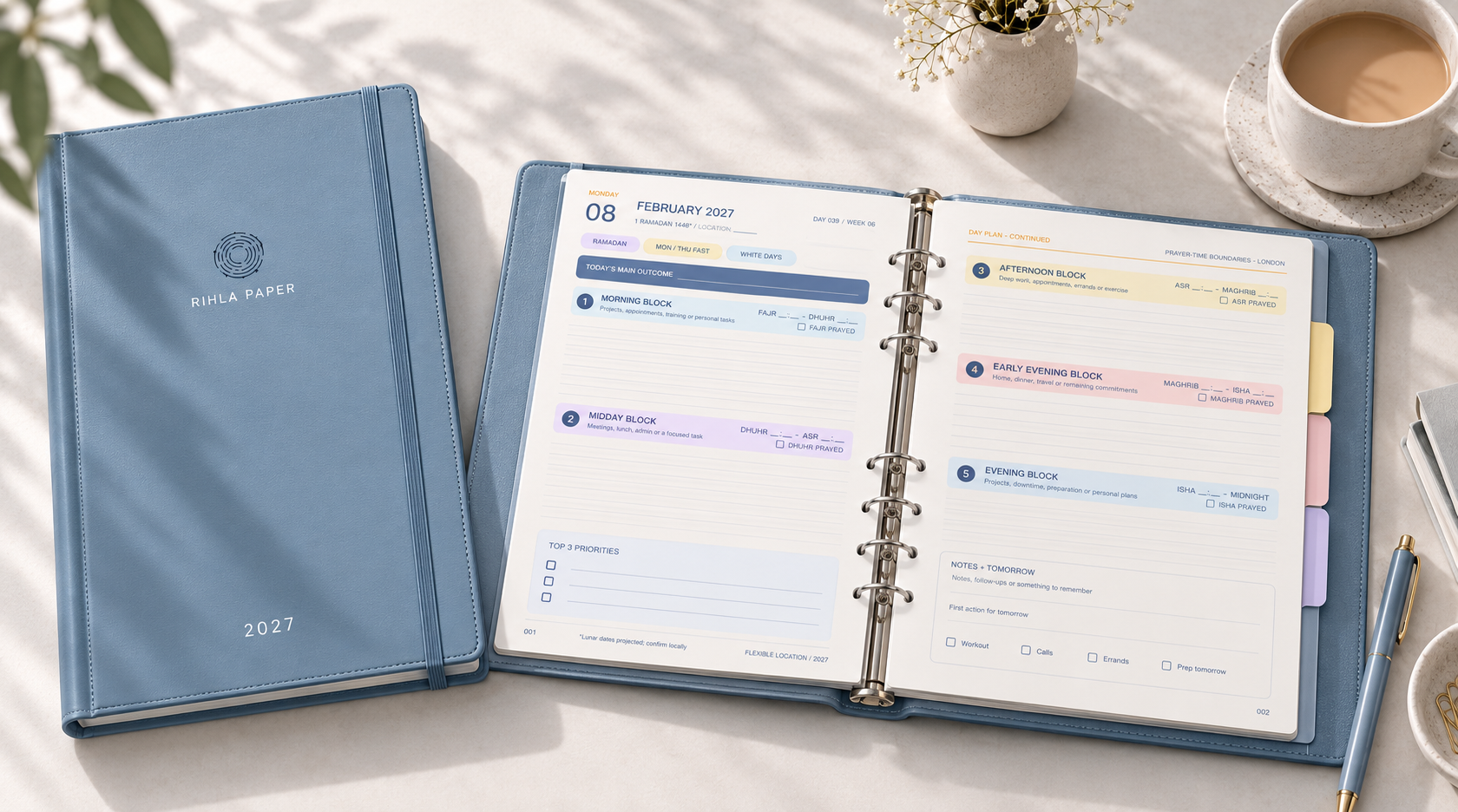 The reusable A5 6-ring binder opened to its two-page daily spread, with the full year supplied as four quarterly refill packs.